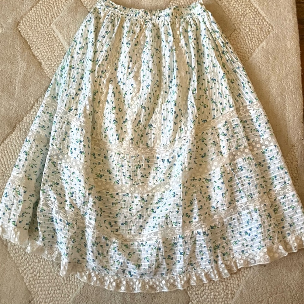 Love Shack Fancy cotton maxi skirt with lace accent. Size large
